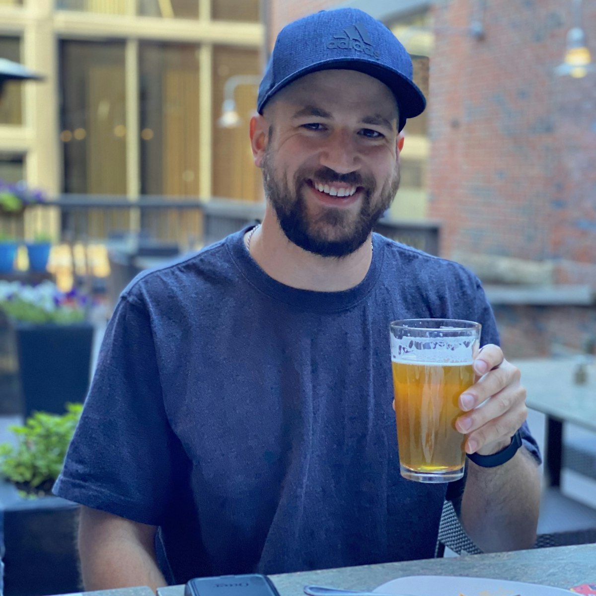 Joe enjoying a cold beer at lunch